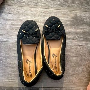 Black and gold flats. Never worn
